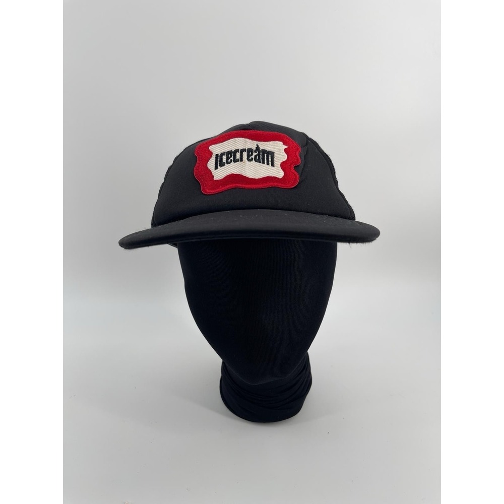 Icecream Inset Trucker Hat in black mesh with a red and white logo patch.